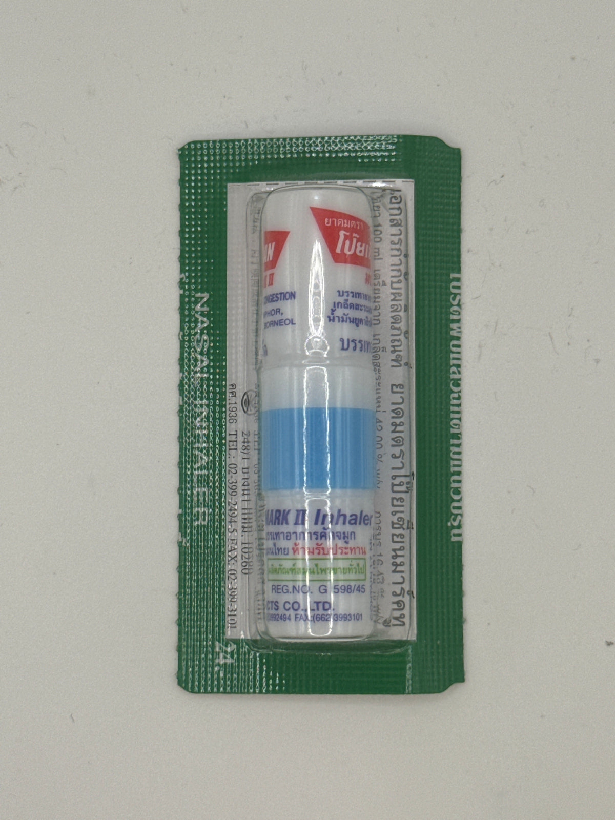 Poy Sian Mark II nasal inhaler with blue band in sealed green blister packaging.