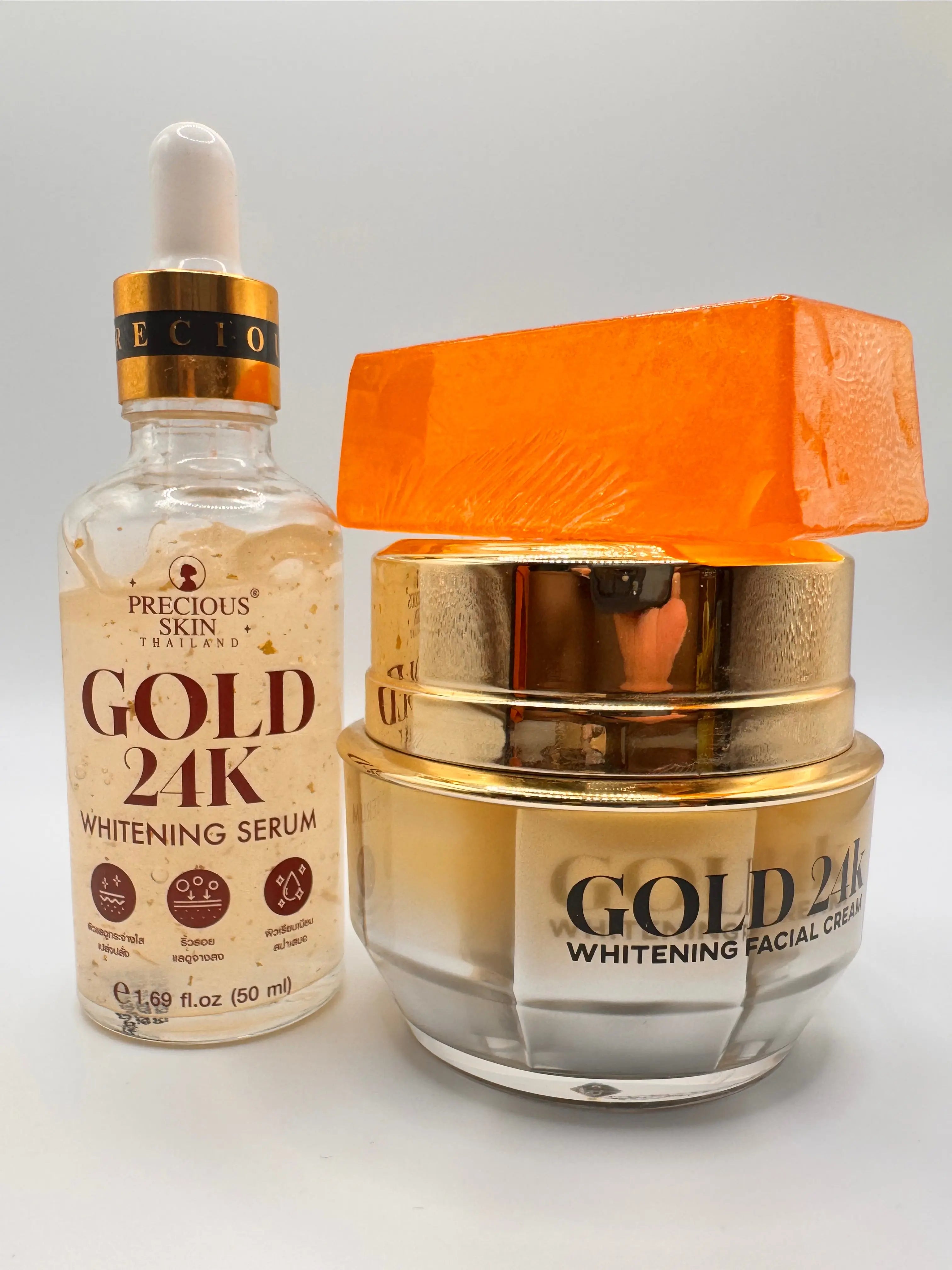 "Precious Skin Gold 24K Anti-Melasma Bundle product labels showing key ingredients 24K gold, alpha arbutin, and niacinamide"