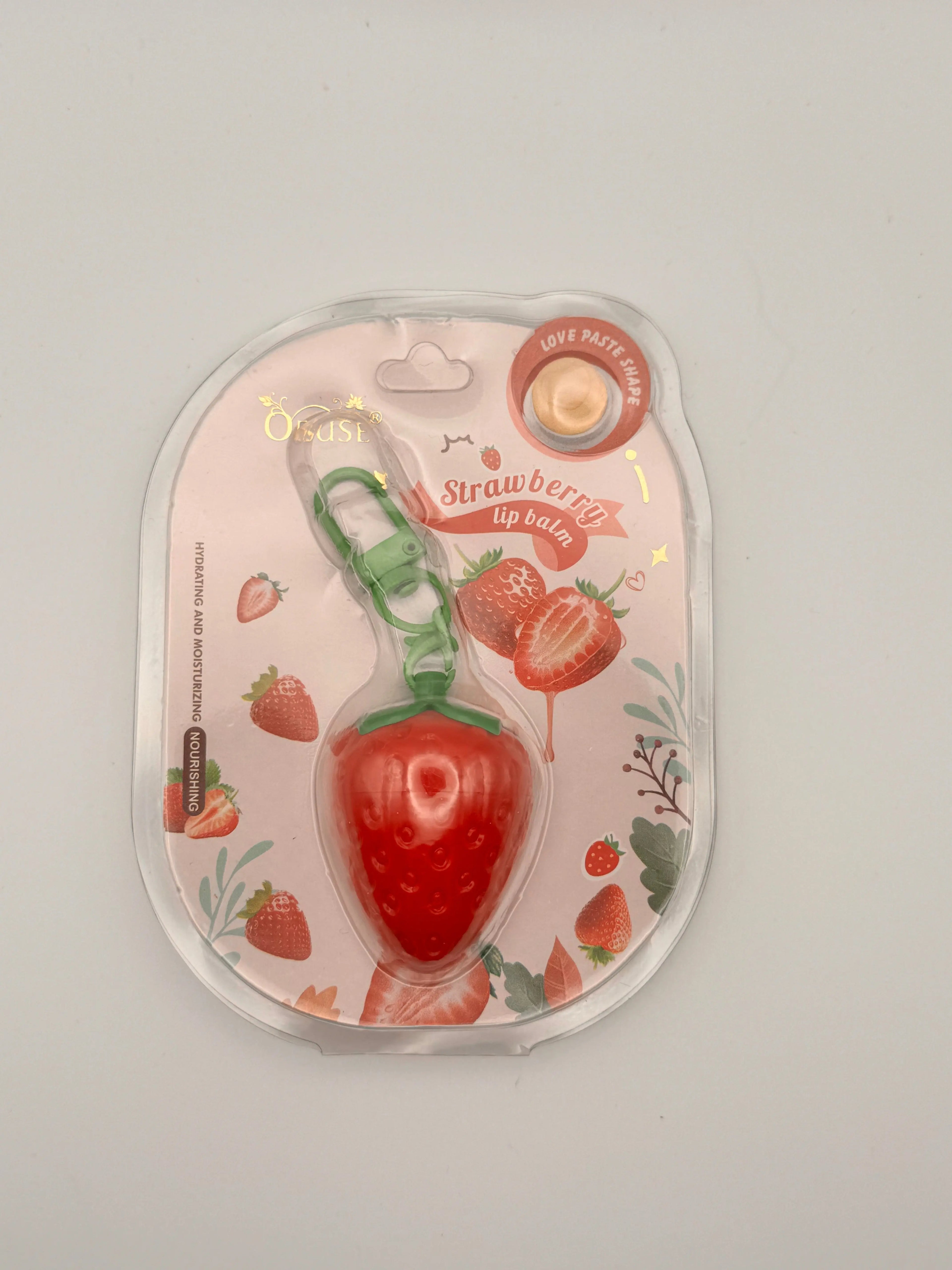 "Obuse Strawberry Magic Lip Balm - Thai moisturizing lip balm with strawberry extract, shea butter, and vitamin E for soft, plump, hydrated lips"
