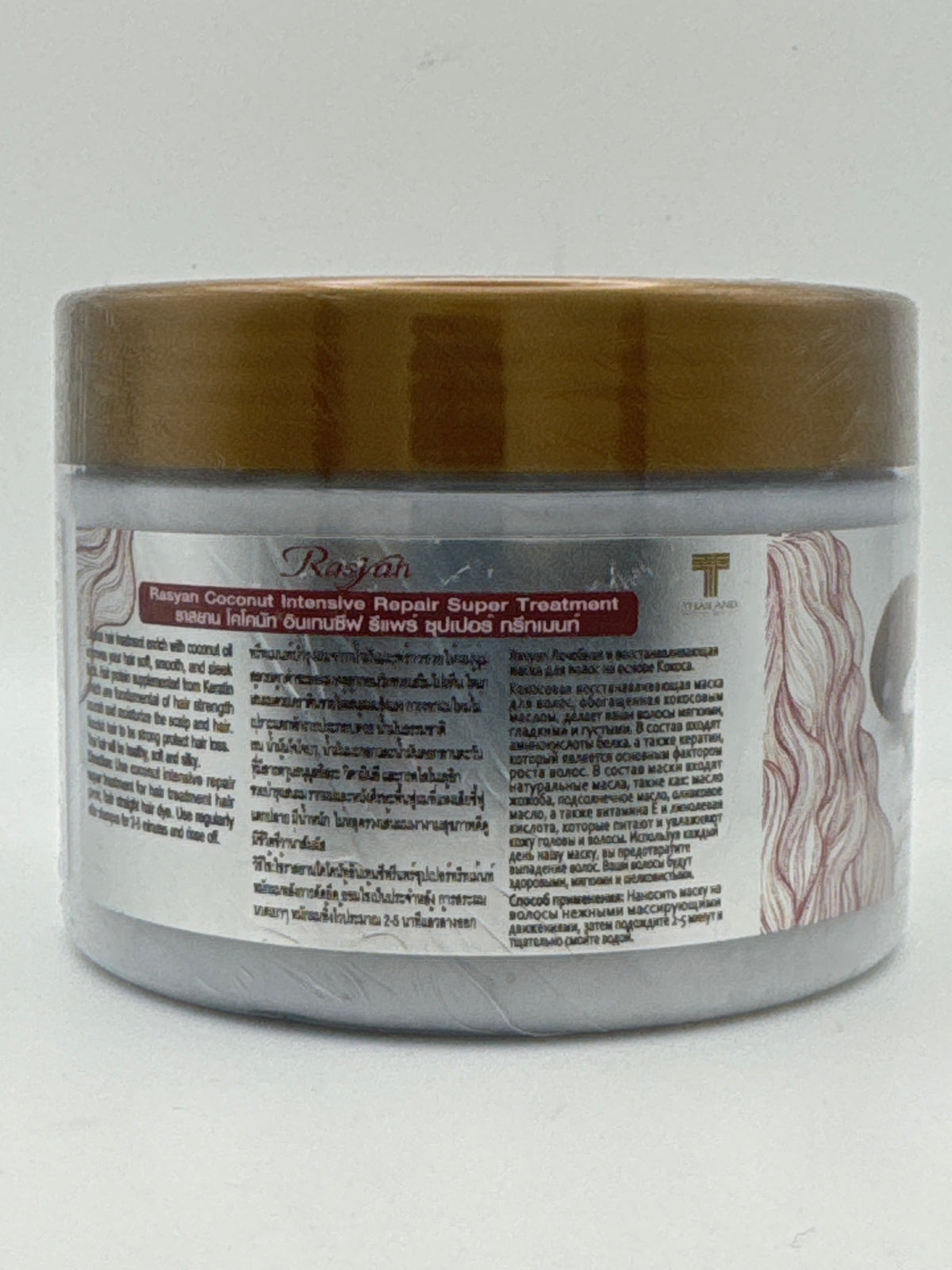Rasyan Coconut Intensive Repair Super Treatment tub showing multilingual directions and a flowing hair illustration.