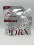 Jennie Moon 10X PDRN Premium Repair Hair Mask, 100 ml silver pouch with burgundy lettering and white spout cap.