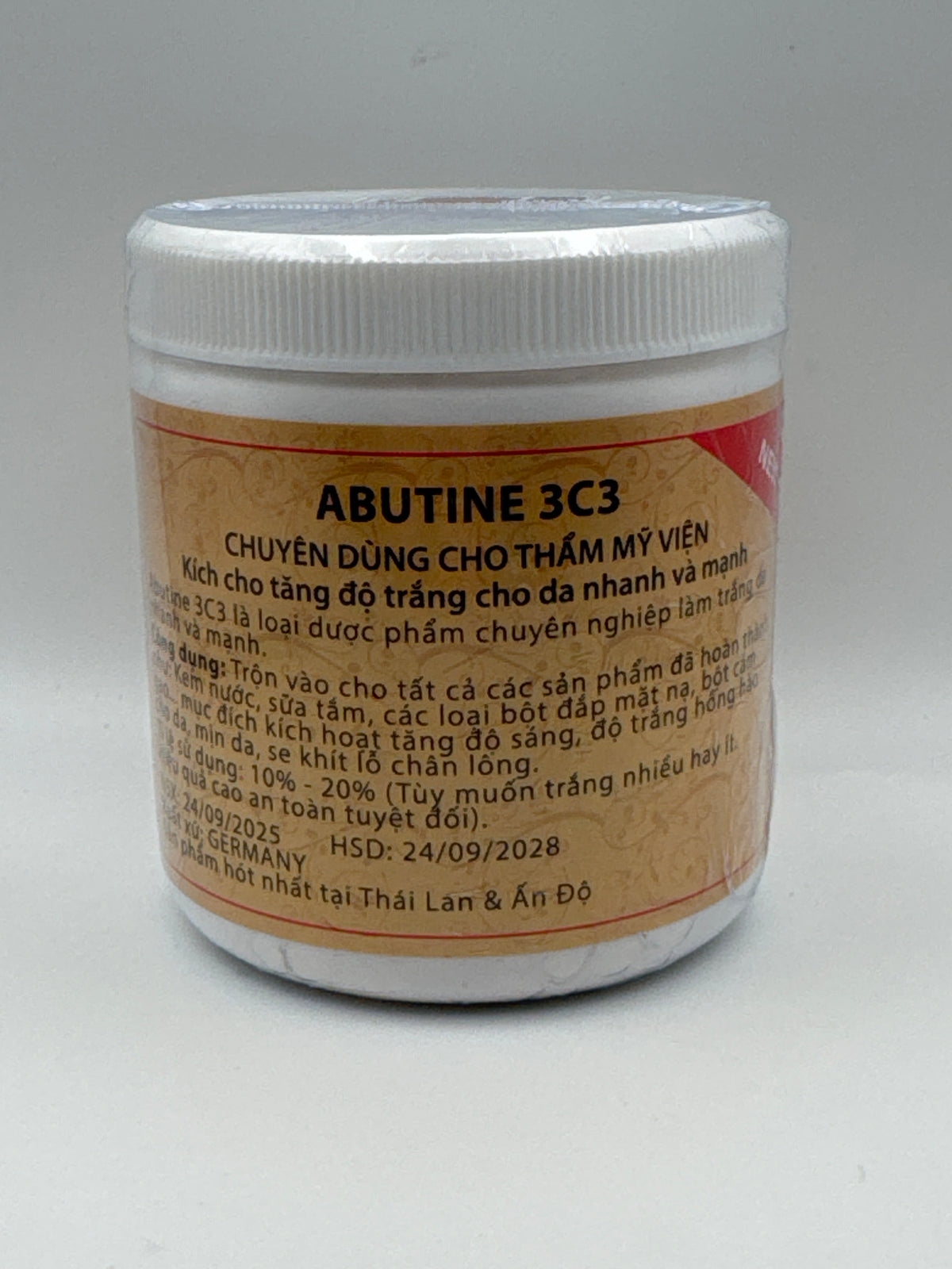 Abutine 3C3 Cream jar showing the Vietnamese-language label with product information and printed dates.