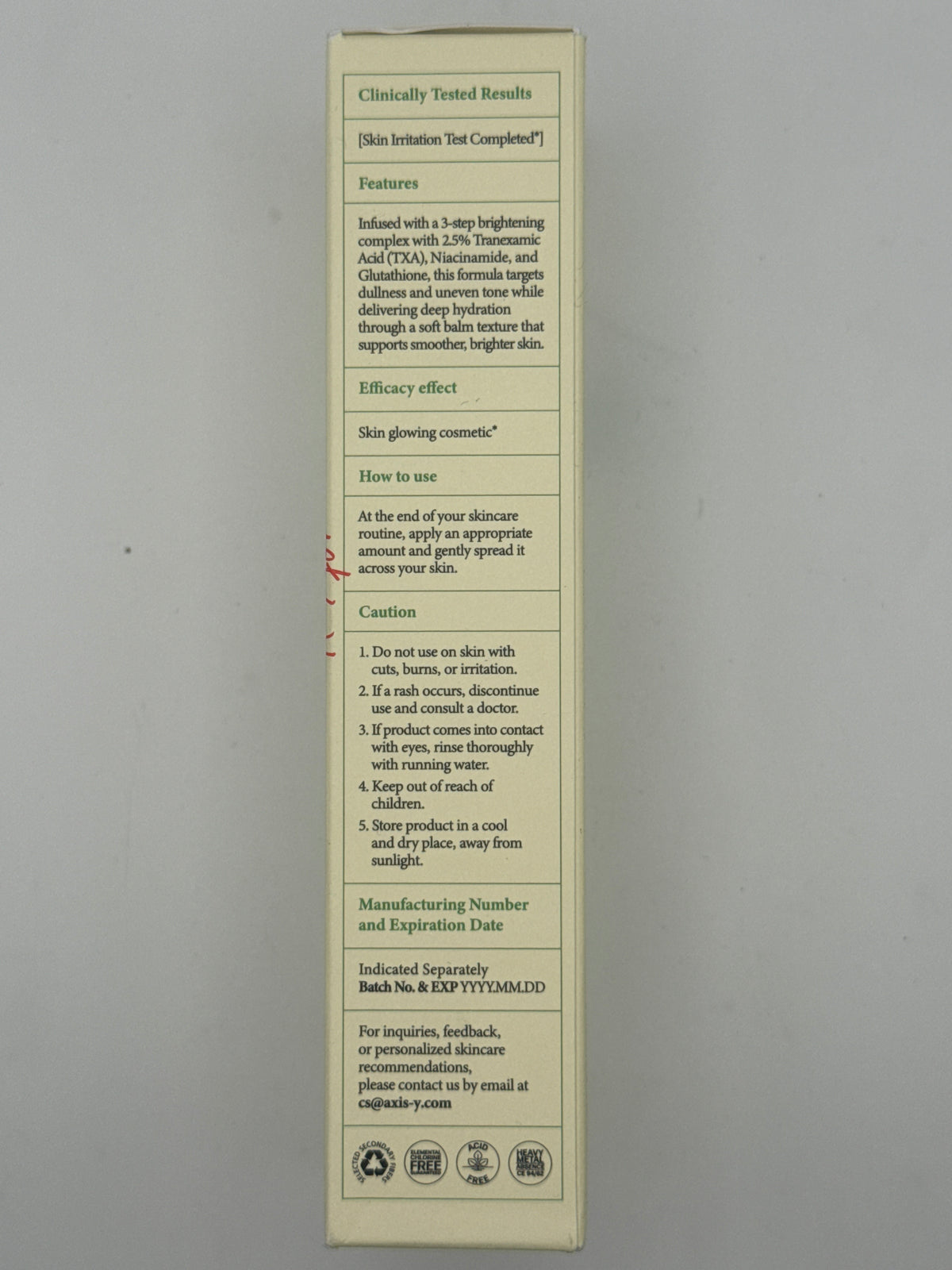 Directions panel: AXIS-Y TXA 2.5% Intensive Brightening Cream packaging showing usage instructions, warnings, and storage directions.