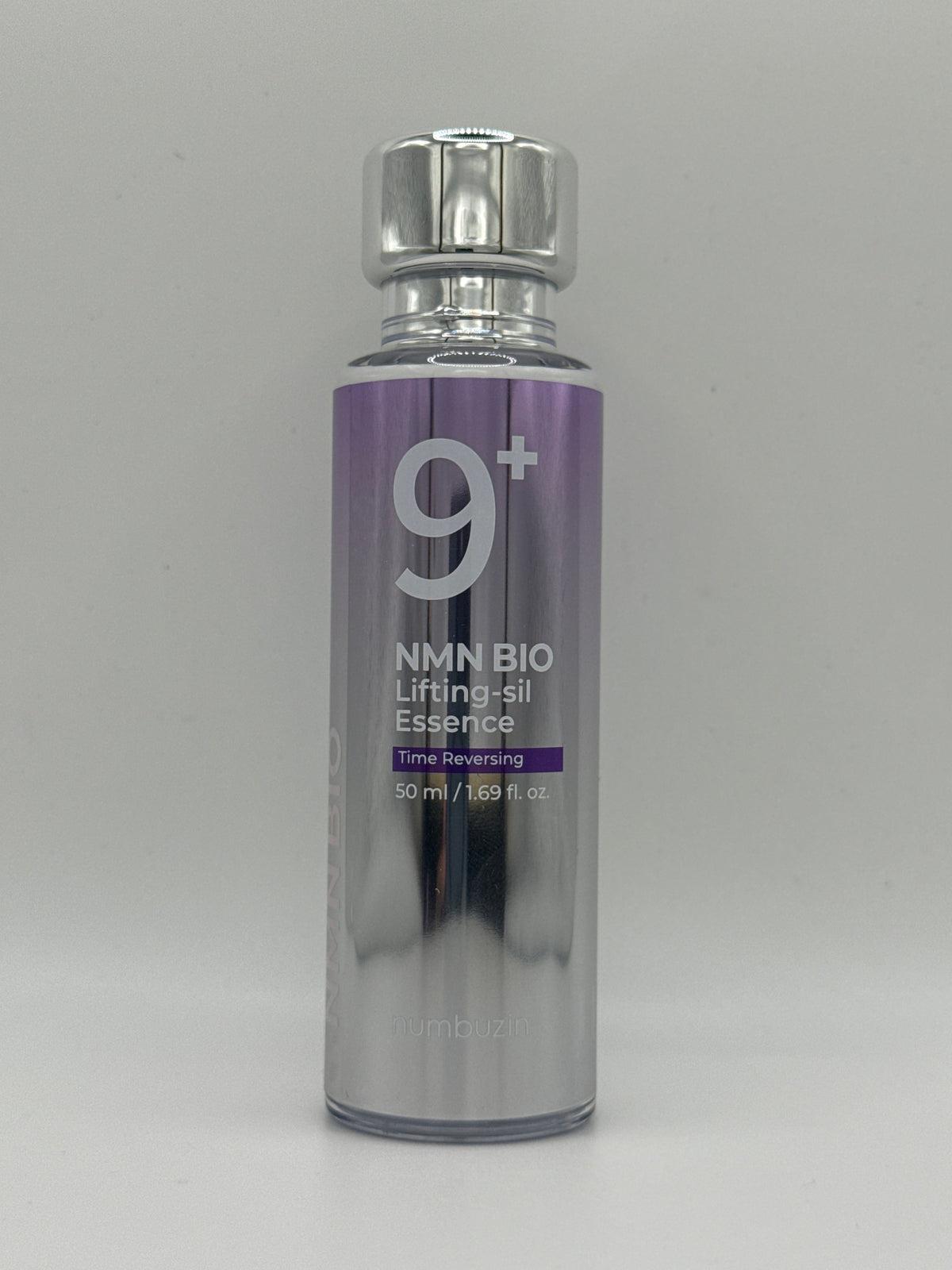 Numbuzin No. 9 NMN Bio Lifting-sil Essence 50 ml purple-and-silver bottle with silver cap, front view.