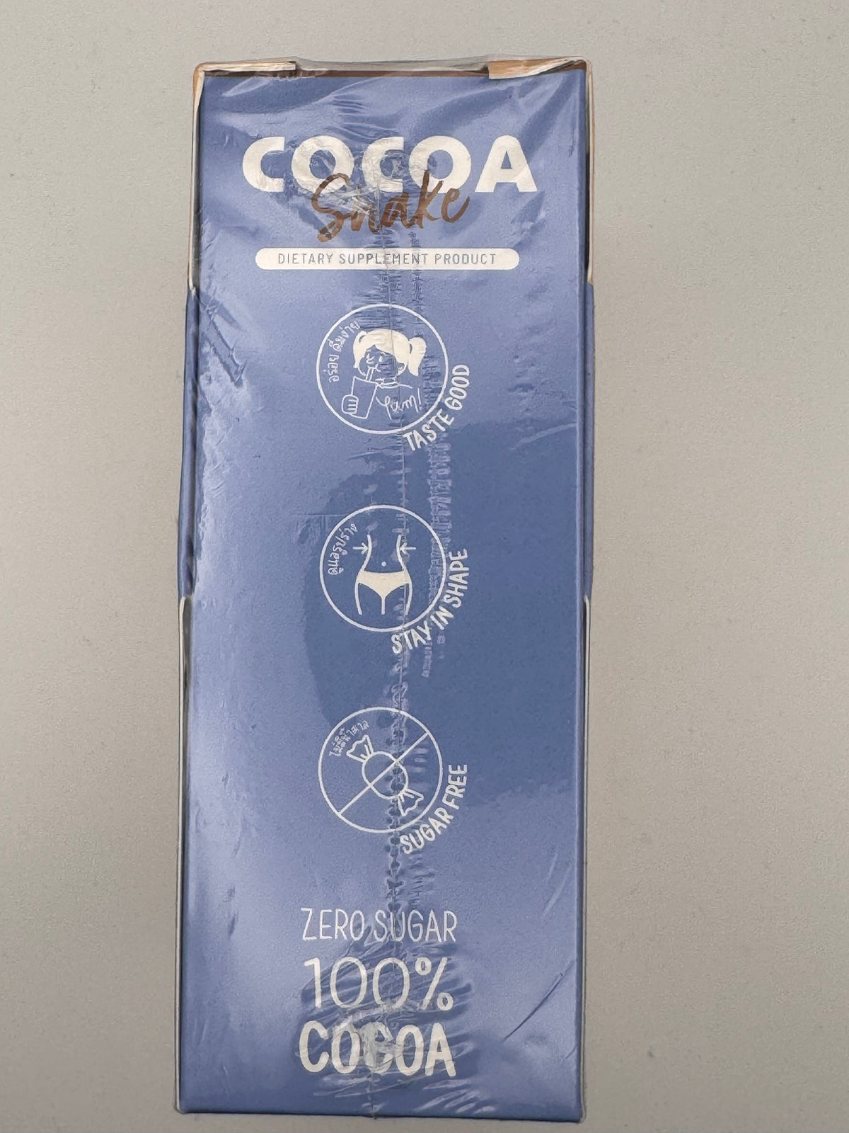  Side of the blue Chong Du Cocoa Shake box with taste good, stay in shape and sugar free icons and zero sugar 100% cocoa text