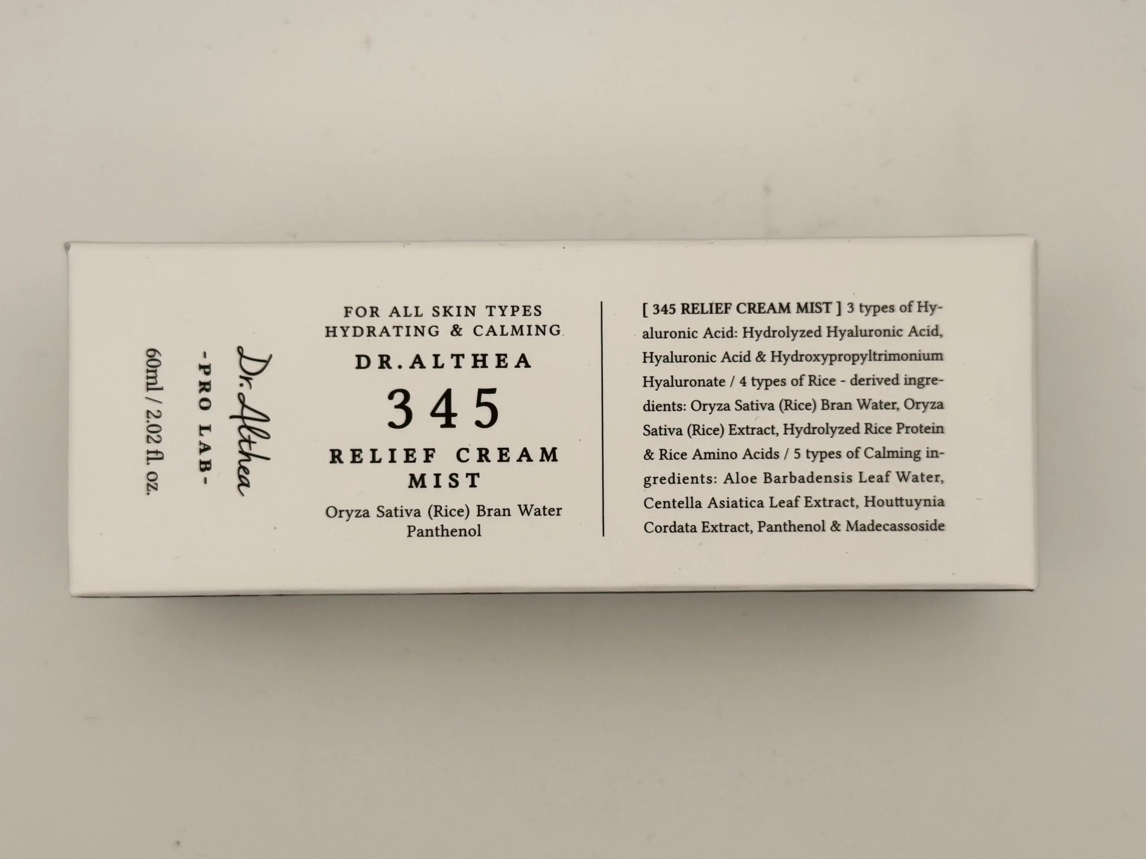 "Dr. Althea 345 Relief Cream Mist 60mL being misted on face for instant hydration and redness relief"
