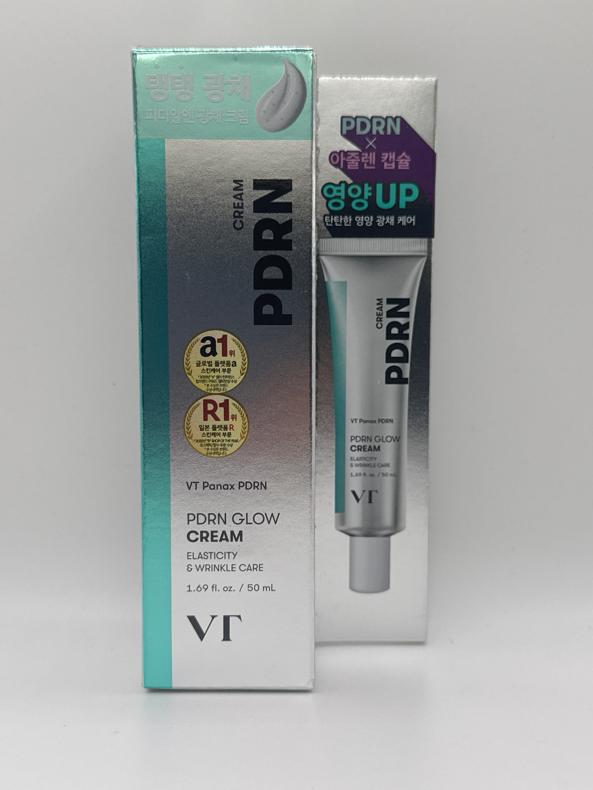 VT PDRN Glow Cream 50 ml silver-and-teal box beside a display panel featuring the cream tube.
