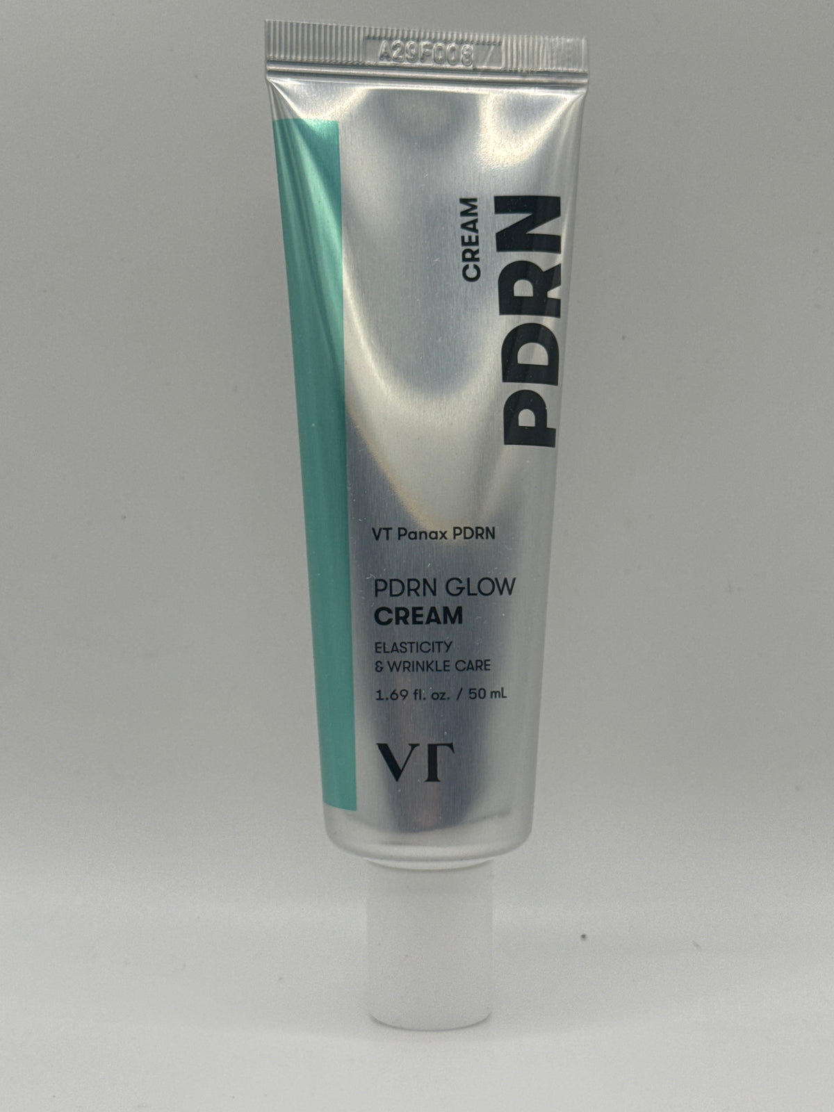 VT PDRN Glow Cream 50 ml silver tube with teal accent and white cap, front view showing Panax PDRN labeling.