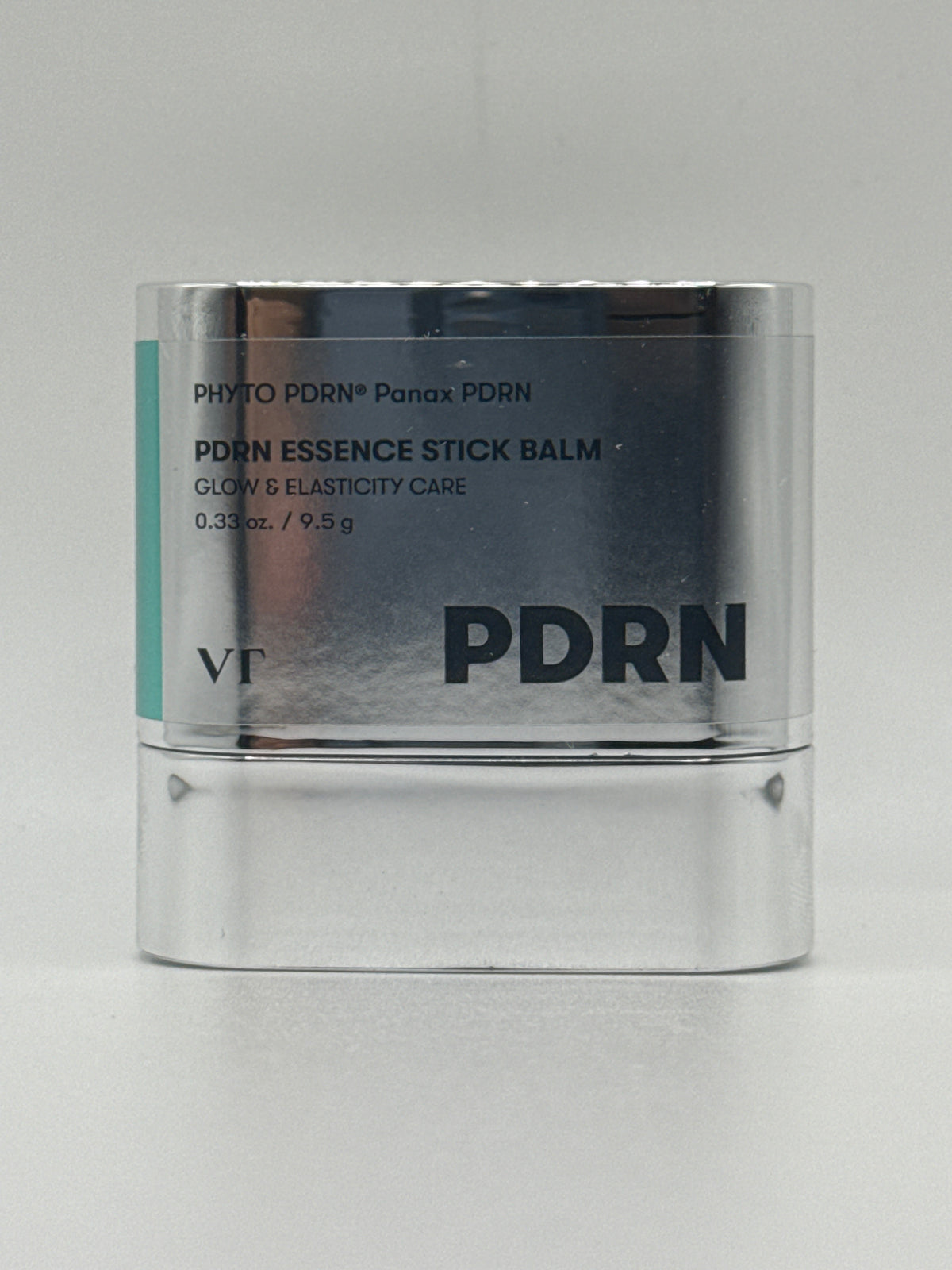 VT PDRN Essence Stick Balm 9.5 g silver container with teal accent, front view.