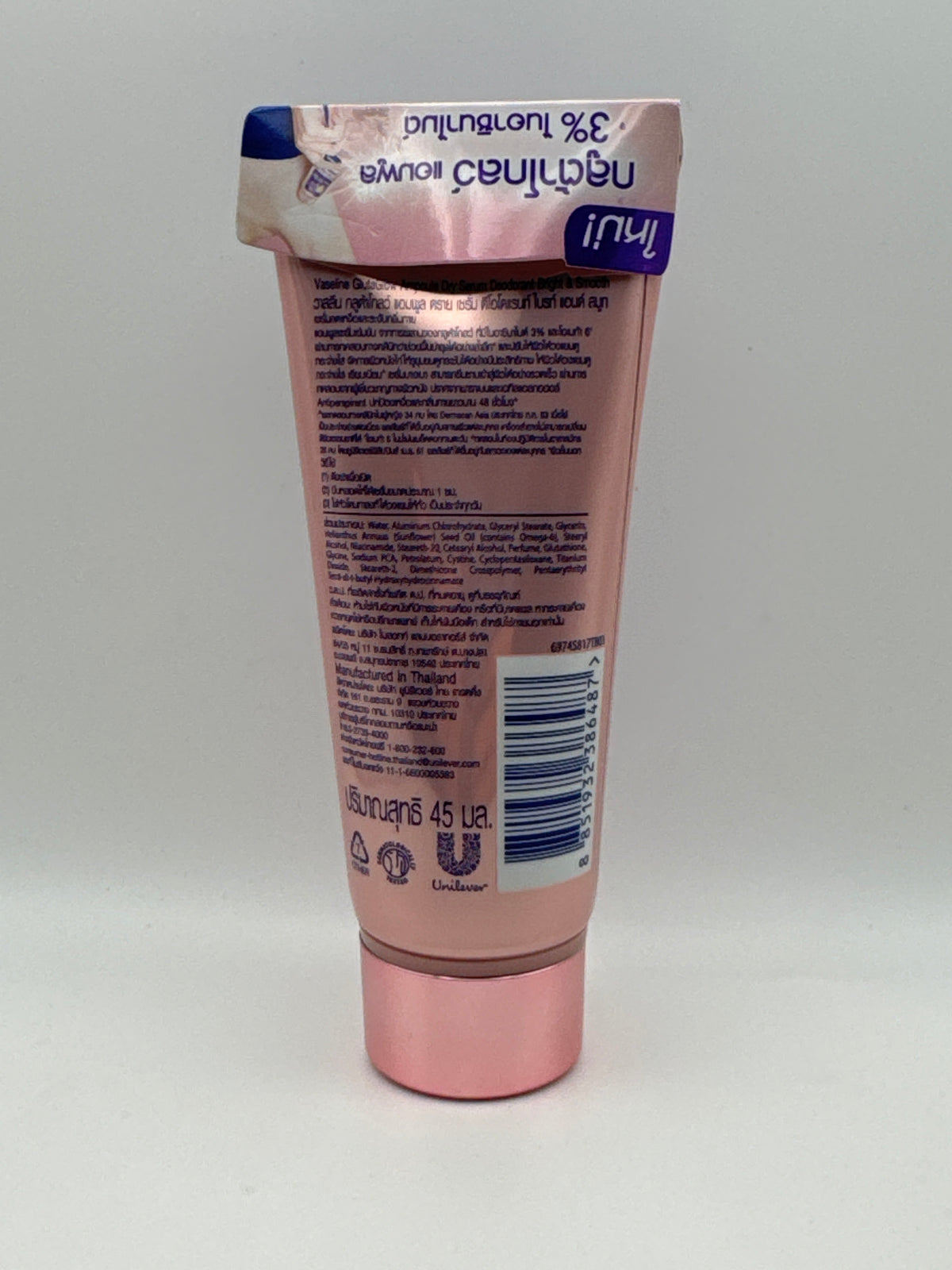 Back of Vaseline GlutaGlow Bright & Smooth deodorant 45 ml pink tube showing ingredients, Thai-language directions, and barcode.