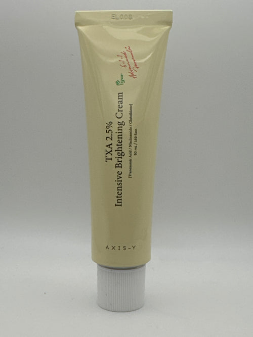 Tube photo: AXIS-Y TXA 2.5% Intensive Brightening Cream 50 mL pale yellow tube with a white cap and tranexamic acid, niacinamide, and glutathione labeling.