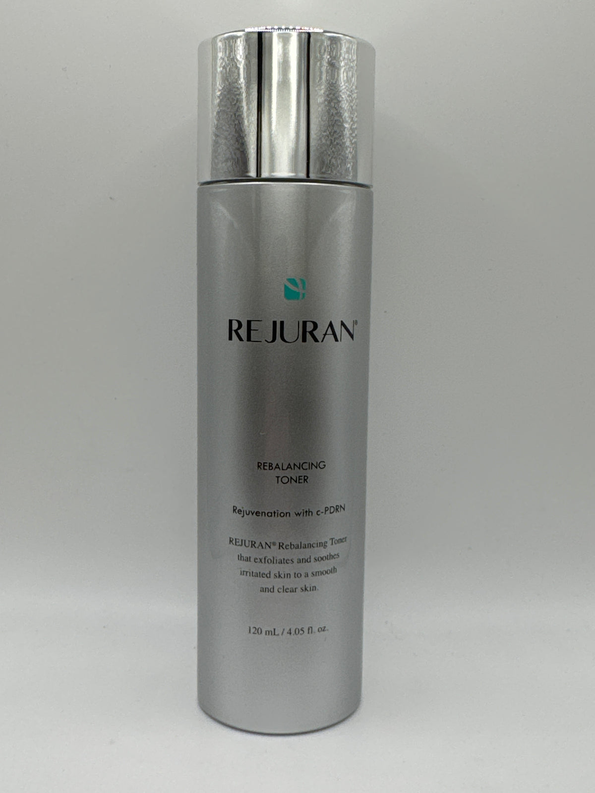 Rejuran Rebalancing Toner 120 ml silver bottle with reflective silver cap, front view.