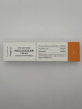 Front photo: Dr. Althea Melaclear Cream 20 g box showing tranexamic acid, niacinamide, and licorice root water concentrations.