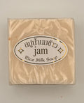 "Jam Rice Milk Soap bars unwrapped showing creamy rice milk texture for brightening face and body"
